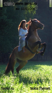 Девушка на лошади для Nokia 600