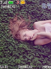 Девушка на траве для Nokia Asha 201