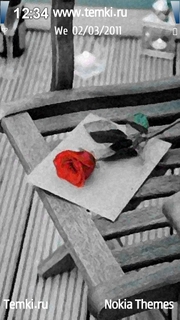 Роза на стуле